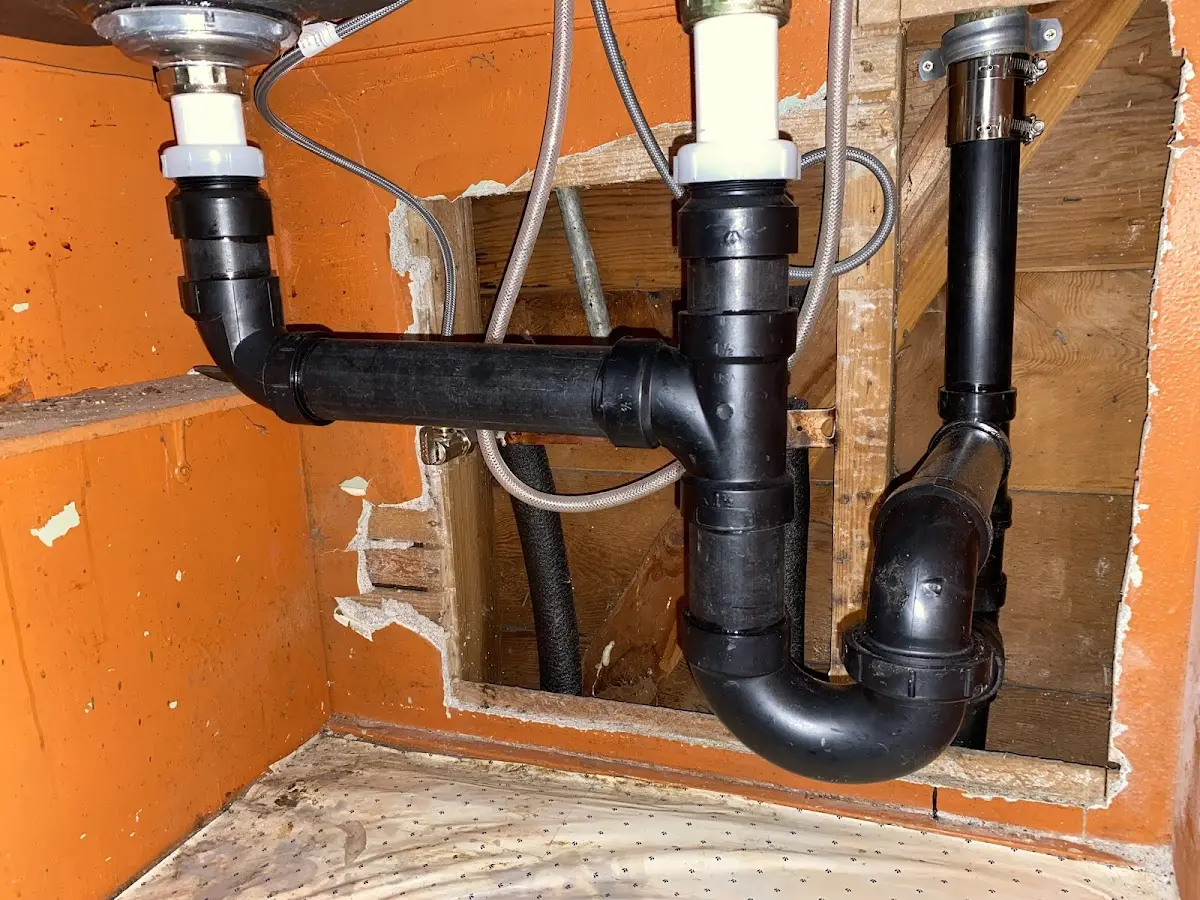 Professional Garbage Disposal Repair equipment and tools on the job in Rye